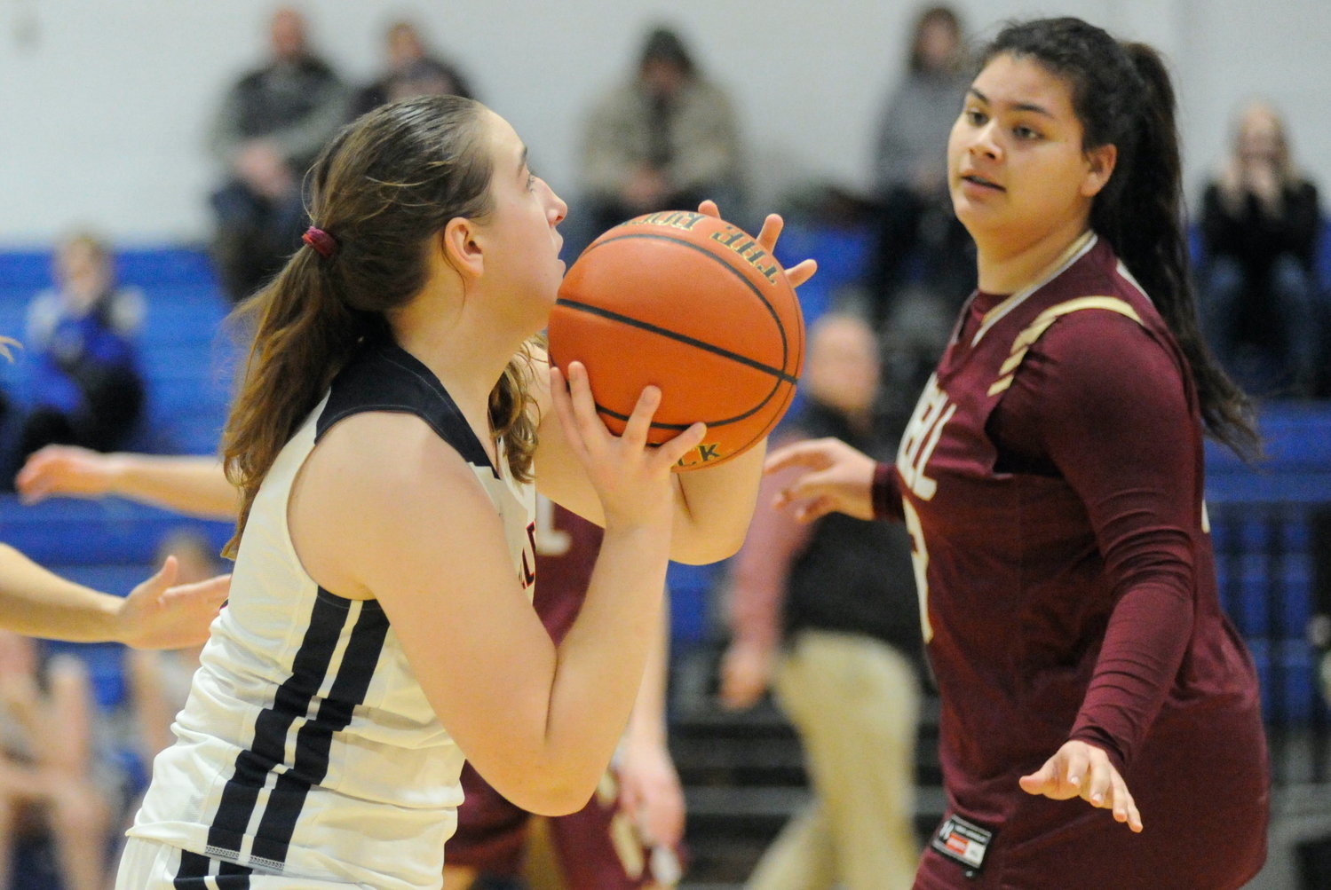 Eyes up!  Tri-Valley’s Emily Rusin and O’Neill’s Audrey Elisondo, who posted 14 points for the Lady Raiders on offense...